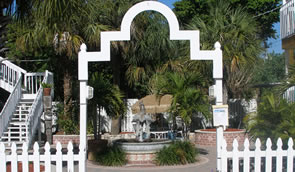Arch leading into hotel courtyard